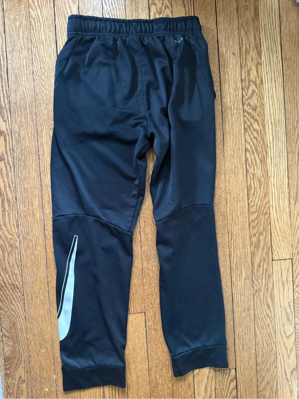 Nike Kids' Black Dri-FIT Athletic Pants with White Swoosh - Size XL